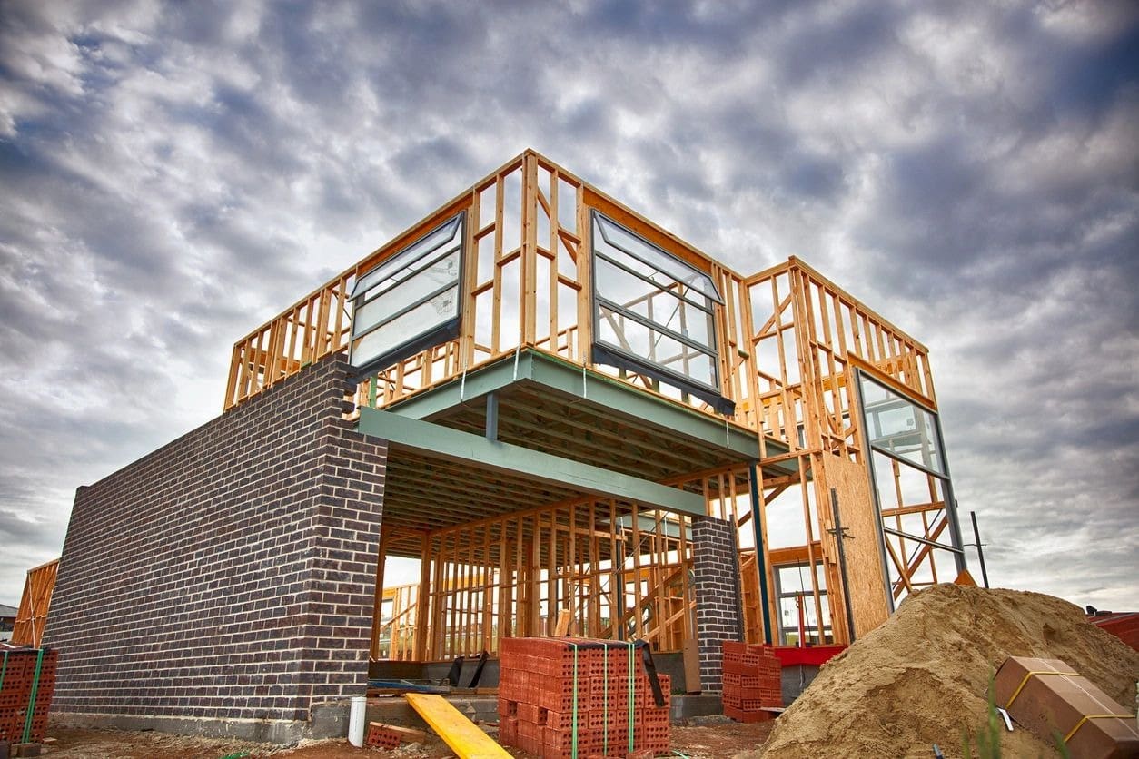 A building under construction with scaffolding around it.