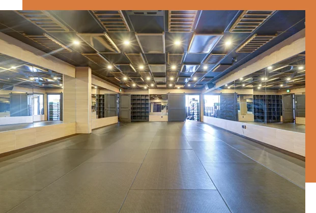 A large room with many lights on the ceiling.