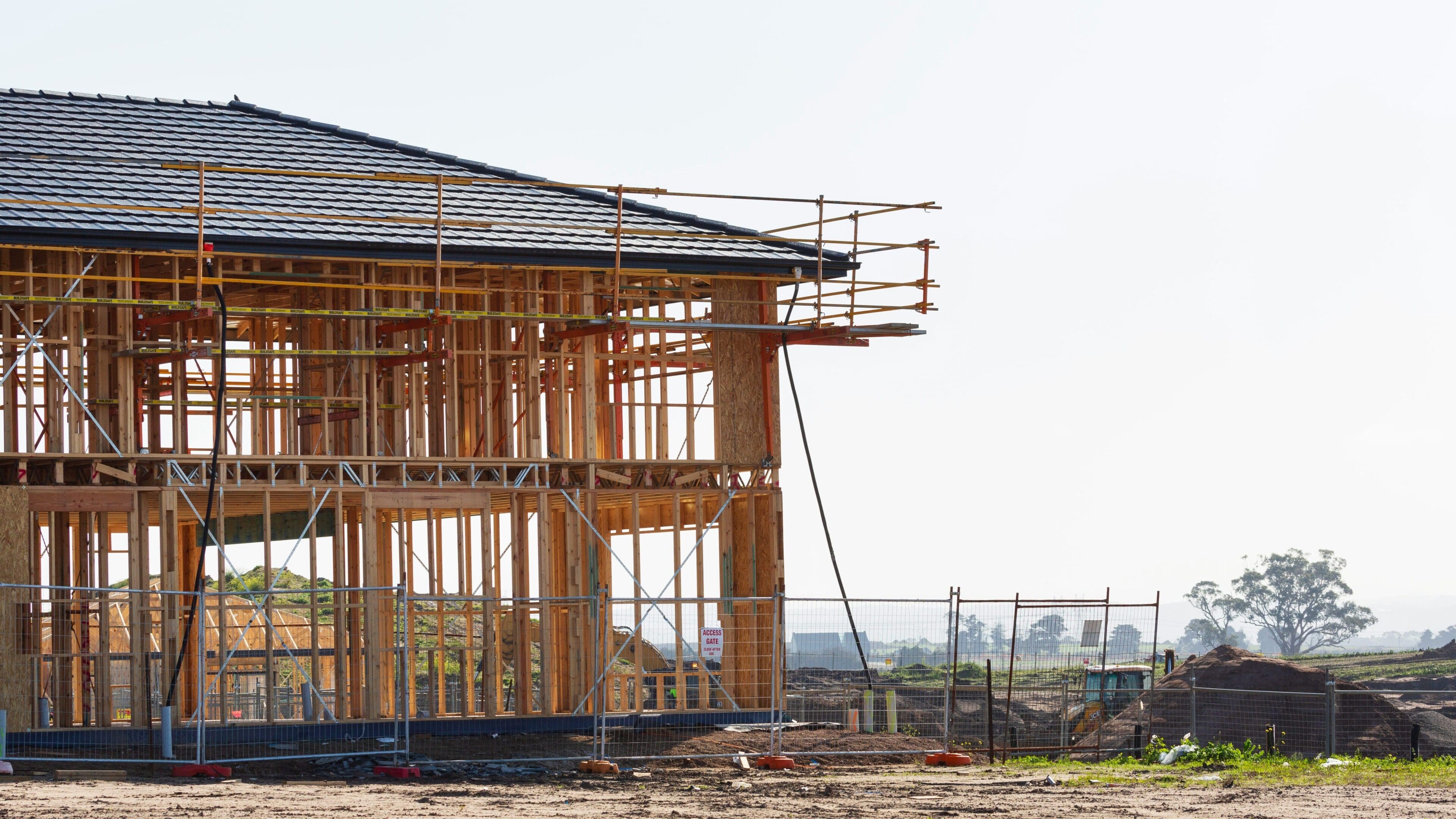 A building under construction with scaffolding around it.